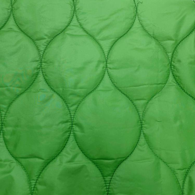 Ткань стёганая курточная "Волна" 9,5см. цвет зелёный